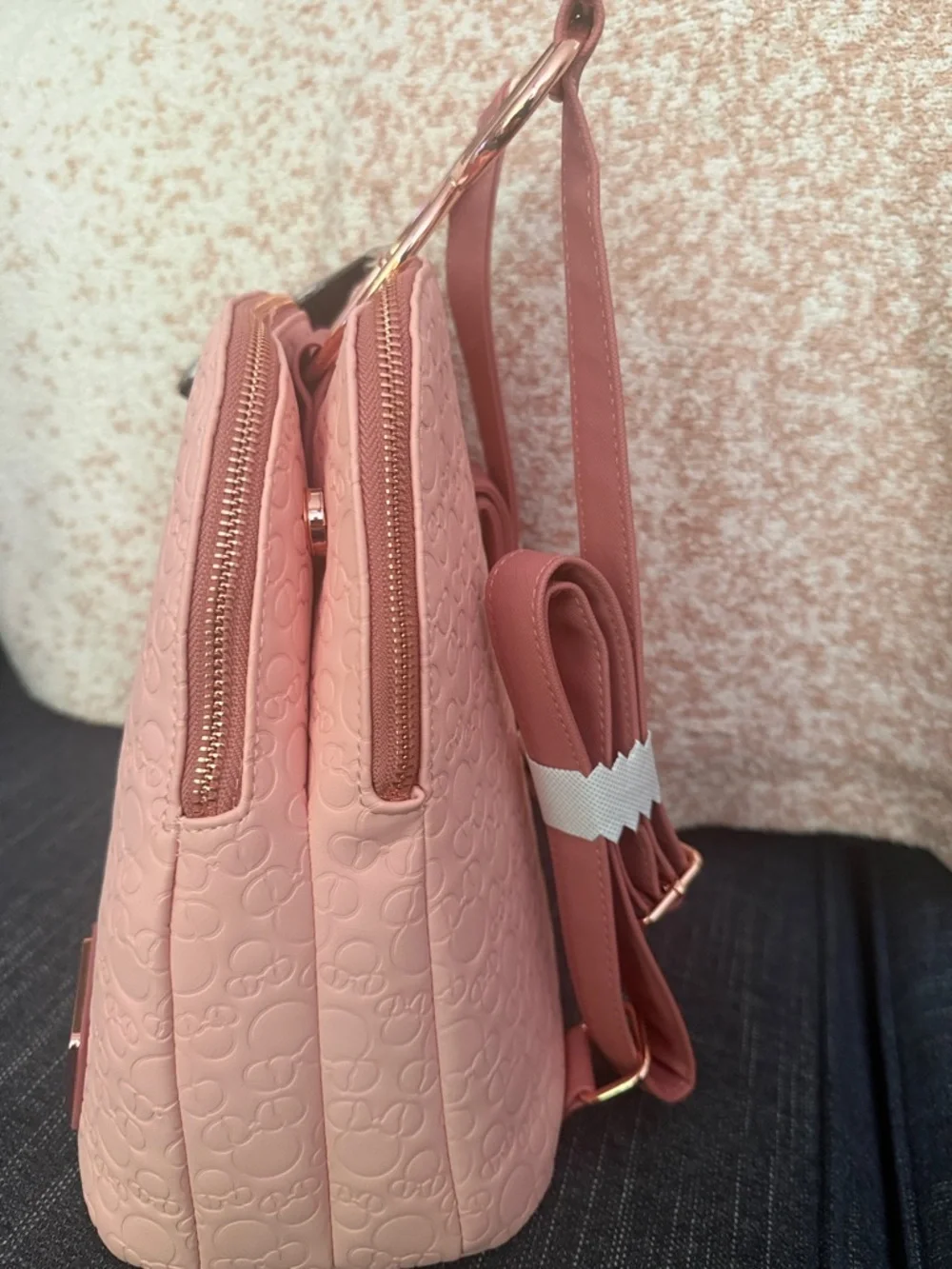 Loungefly Minnie Mouse Embossed Pink Mini Backpack with Rose Gold Bow